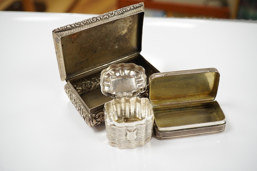 A George IV silver snuff box, by Nathaniel Mills (a.f.), Birmingham, 1827, 84mm, a Dutch white metal pill box and a Portuguese white metal snuff box. Condition - poor to fair